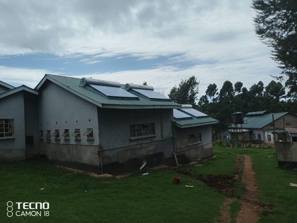 Centralised solar water heating at Mirema School, Nairobi: collectors and tanks on green-roofed school buildings