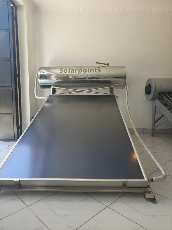 Flat plate pressurized solar water heater with polished stainless steel tank in a showroom